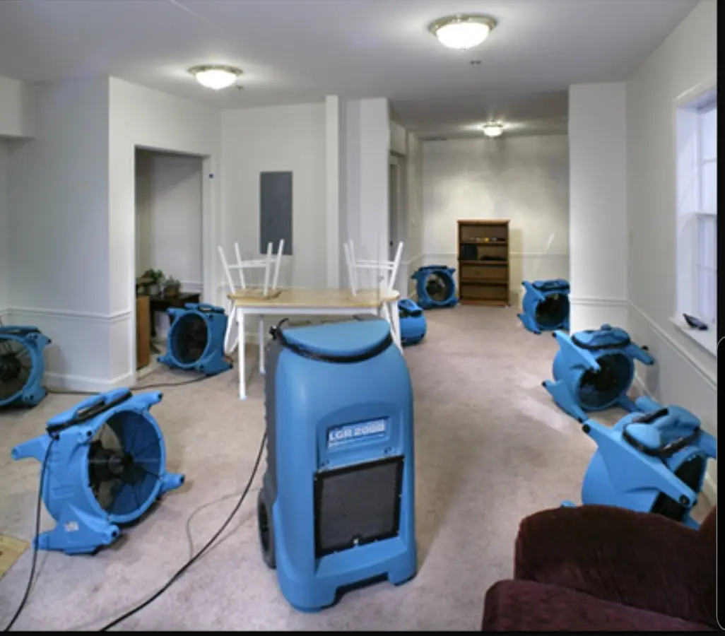 Air movers and dehumidifier setup for Water Damage Restoration in West Little River